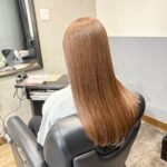 縮毛矯正のビフォーアフター。広がりやすい髪、ツヤの出た仕上がり